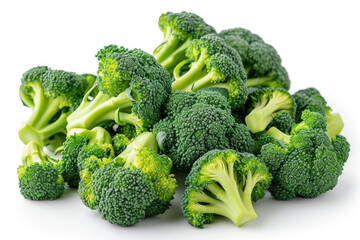 A Pile of Broccoli Florets on a White Surface Fresh broccoli florets arranged neatly on a clean white surface.