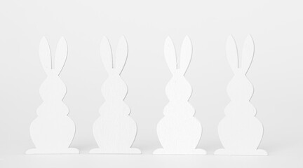 Easter Holiday minimal concept. Row of decorative multicolored easter bunnies isolated. Creative flat lay. For design cards or web banners. Copy space
