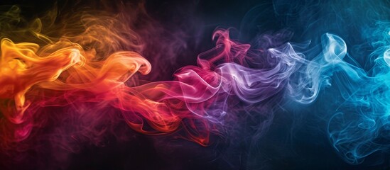 Obraz premium A vibrant cloud of colorful smoke in shades of purple and violet floats on a dark background, resembling a gas-like artistry.
