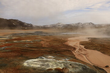 Hverarönd is a hydrothermal site in Iceland with hot springs, fumaroles, mud ponds and very active solfatares. It is located in the north of Iceland