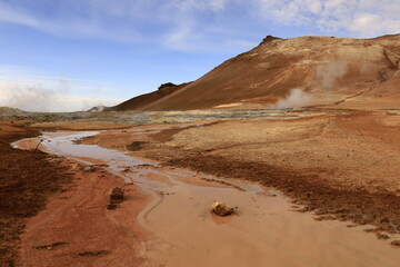 Hverarönd is a hydrothermal site in Iceland with hot springs, fumaroles, mud ponds and very active solfatares. It is located in the north of Iceland