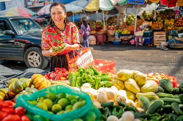 Beautiful Latin woman chats with the buyer in a friendly way.