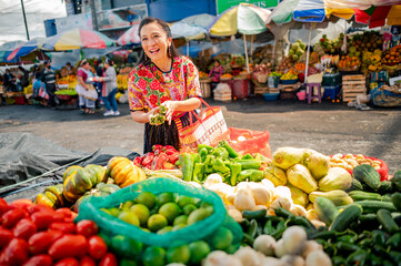 Buyer asks for a discount on the vegetables she wants to buy.