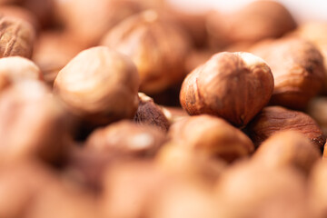 close up of hazelnuts ready for cleaning, hazelnut harvest, nut background raw food nut background, peeled brown nut kernels, healthy organic bio products, vegetarian, vegan and raw food, healthy fat