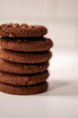 chocolate cookies on blue marble background,chocolate cookies stacked,Cookies with chocolate chips