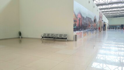 photo of airport passenger waiting room chairs