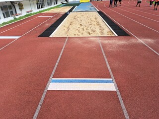 Long jump track on an athletic field