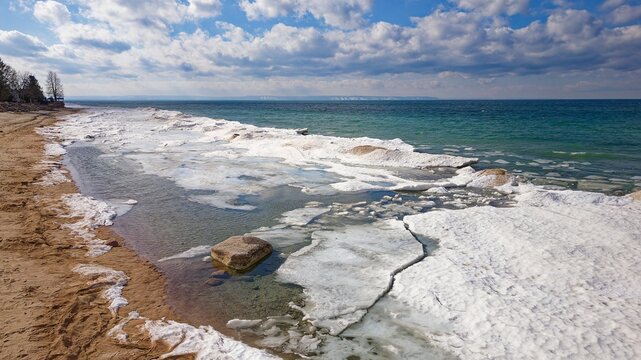 Drone shot of Georgian Bay Ice Pack Breaking Up and Melting in February when unseasonably warm