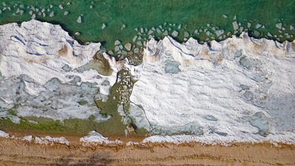 Drone shot of Georgian Bay Ice Pack Breaking Up and Melting in February when unseasonably warm