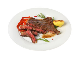 Delicious grilled beef steak with pepper, spices and lemon isolated on white