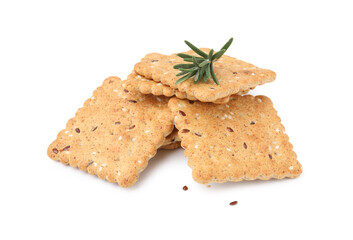 Stack of cereal crackers with flax, sesame seeds and rosemary isolated on white