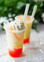 Delicious and refreshing milk based beverage, ice milkshake, cold drink, with different topping and mix