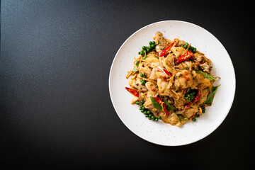 stir fried holy basil with fish and herb