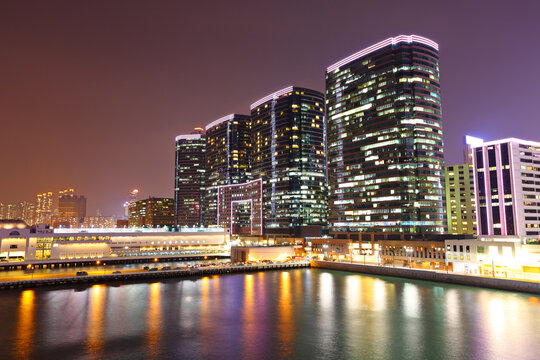 office buildings at sea coast at night