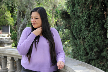 40 year old Latina woman suffers from cough and sore throat due to allergy or cold or flu infection