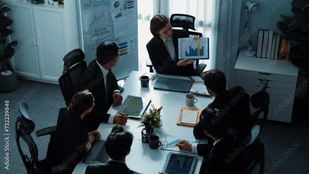Poster top view of smart business woman show increasing sales chart to diverse team while group of diverse 