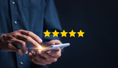 Customer experience concept. Person use smartphone give excellent five-star ratings for service,...