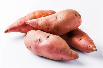 Sweet potatoes set against a white backdrop