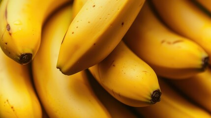 Close up of vivid yellow bananas with texture.