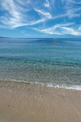 Fototapeta na wymiar Corsica, France, transparent turquoise water on a beautiful beach in summer 