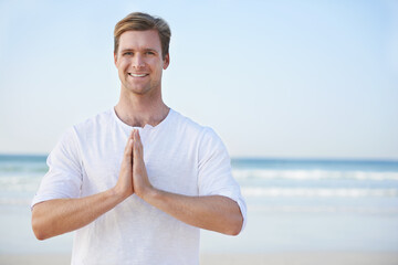 Man, yoga and beach with smile in portrait for peace, zen and space for mockup on vacation with...