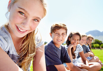 Children, friends and portrait in nature or relax on academy trip for adventure, learning or summer. Girls, boys and face in park for sunshine or bonding group or class together, outdoor or explore © GR/peopleimages.com