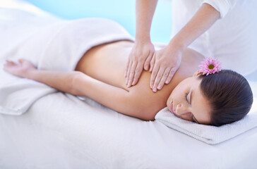 Sleep, spa and woman at pool for massage with health, wellness and luxury holistic treatment. Self care, peace and girl on table with professional masseuse for body therapy, relax and hotel service