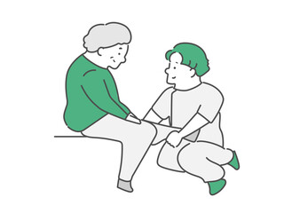 男性理学療法士と高齢女性