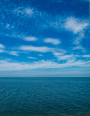 Landscape beautiful summer vertical horizon look view tropical shore open sea beach cloud clean and blue sky background calm nature ocean wave water nobody travel at  thailand chonburi sun day time