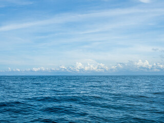 Obraz premium Landscape beautiful summer panorama horizon look view tropical shore open sea beach cloud clean blue sky background calm nature ocean wave water nobody travel at Koh Muk Trang Thailand sun day time