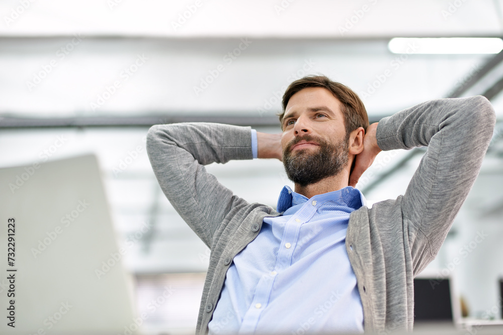 Poster happy, rest and business man in office thinking, daydreaming and relax on break at desk. hands on he