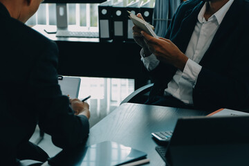 Business team meeting working with new startup project, discussion and analysis data the charts and...