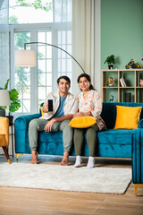 Obraz premium Indian Mother and son using smartphone.