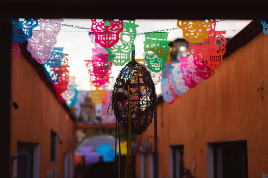 Skull papel picado in Mexican courtyard