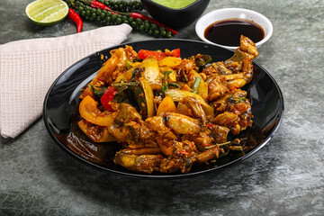 Vietnamese cuisine - fried frog with vegetables