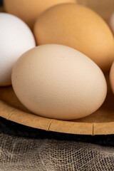fresh chicken eggs on the kitchen table