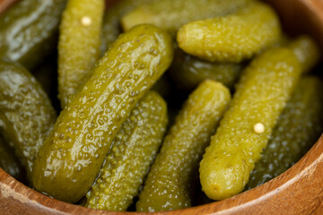 green pickled cucumbers on the table