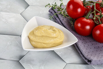 Dijon mustard sauce in the bowl