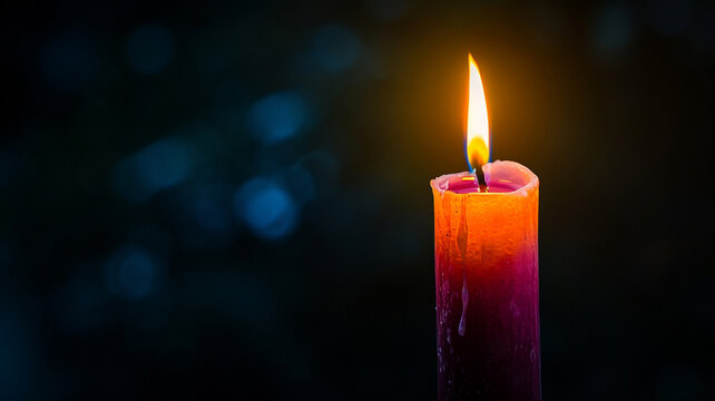 .An image of a candle illuminating a dark room with vibrant colors