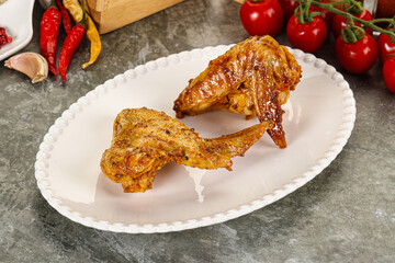 Tasty roasted chicken wing with spices