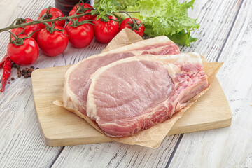 Raw pork t-bone steak for grill