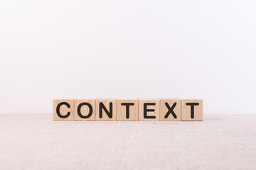 CONTEXT word from building blocks on a light background