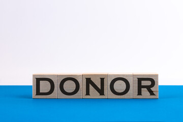 Donor word concept on a blue light background