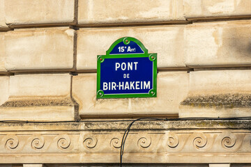 Pont de Bir Hakeim bridge street sign in Paris France - obrazy, fototapety, plakaty