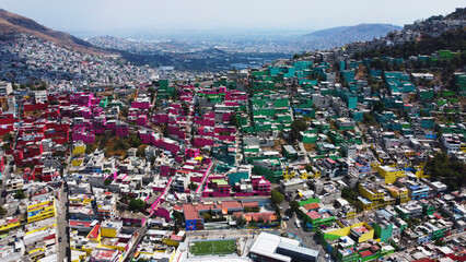 Aerial view of colorful houses in Mexico city. Illegal settlements - favelas in the capital of Mexico, Mexico City. - obrazy, fototapety, plakaty