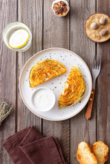 Cabbage steaks with white sauce. Healthy eating. Vegetarian food.