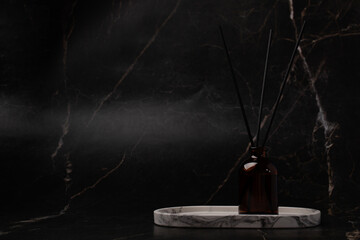 Aroma diffuser on marble background, fragrance therapy, essential oil scent, tranquil atmosphere