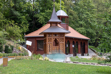 Old wooden building of pump room of Jan mineral healing water, Krynica-Zdroj, Poland