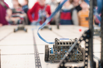 robot competitions, children control robots. High quality photo