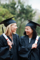 Graduation, certificate and diversity with student friends outdoor on campus for ceremony at...